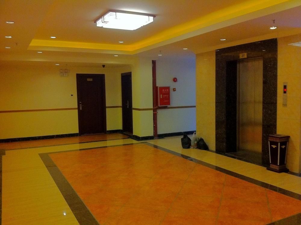 Guoxing Business Hotel Чжаоцин Экстерьер фото