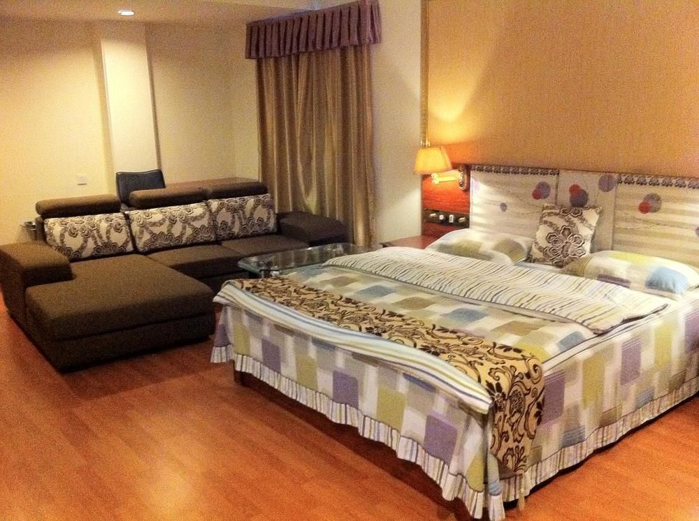 Guoxing Business Hotel Чжаоцин Экстерьер фото