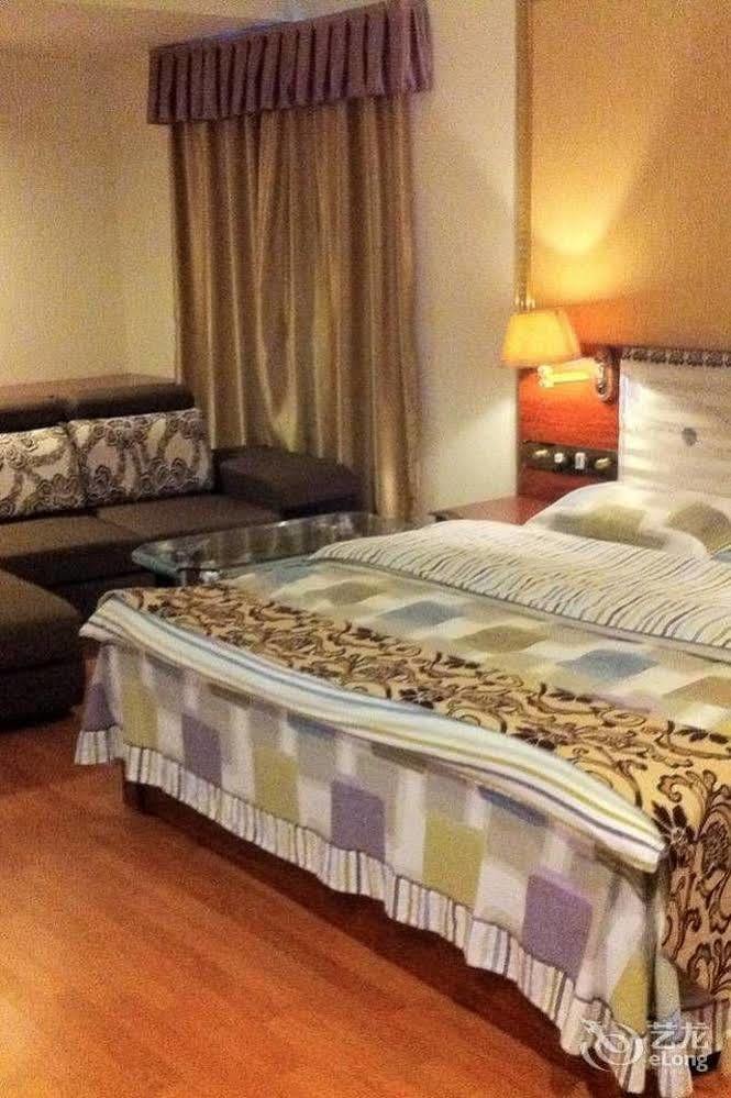 Guoxing Business Hotel Чжаоцин Экстерьер фото